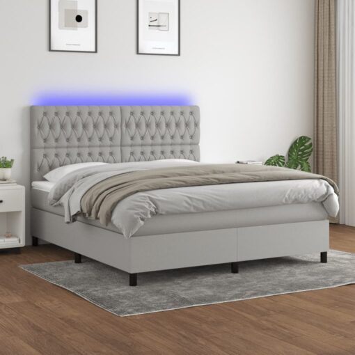 Box spring postelja z vzmetnico LED sv. siva 180x200 cm blago