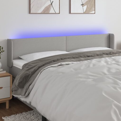 LED posteljno vzglavje svetlo sivo 163x16x78/88 cm blago