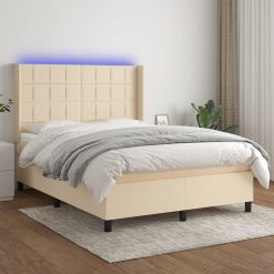 Box spring postelja z vzmetnico LED krem 140x190 cm blago