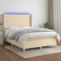 Box spring postelja z vzmetnico LED krem 140x190 cm blago