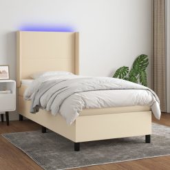 Box spring postelja z vzmetnico LED krem 80x200 cm blago