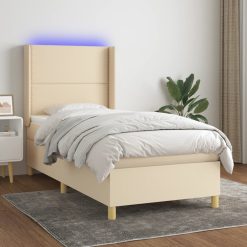 Box spring postelja z vzmetnico LED krem 90x190 cm blago