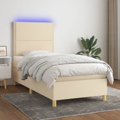 Box spring postelja z vzmetnico LED krem 90x200 cm blago