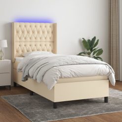 Box spring postelja z vzmetnico LED krem 90x200 cm blago