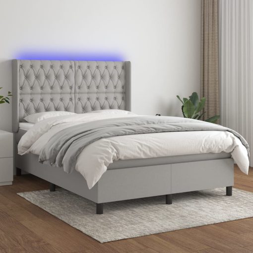 Box spring postelja z vzmetnico LED sv. siva 140x200 cm blago