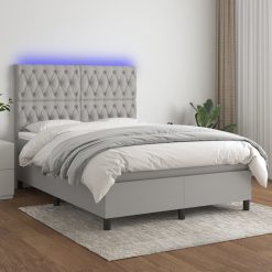 Box spring postelja z vzmetnico LED sv. siva 140x200 cm blago