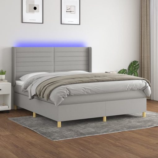 Box spring postelja z vzmetnico LED sv. siva 160x200 cm blago