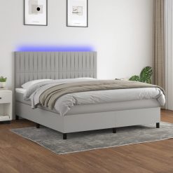 Box spring postelja z vzmetnico LED sv. siva 160x200 cm blago