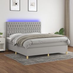 Box spring postelja z vzmetnico LED sv. siva 180x200 cm blago