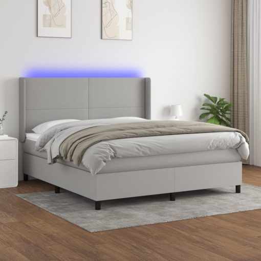 Box spring postelja z vzmetnico LED sv. siva 180x200 cm blago