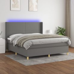 Box spring postelja z vzmetnico LED temno siva 160x200 cm blago