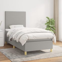 Box spring postelja z vzmetnico svetlo siva 90x190 cm blago