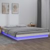 LED posteljni okvir bel 180x200 cm trden les
